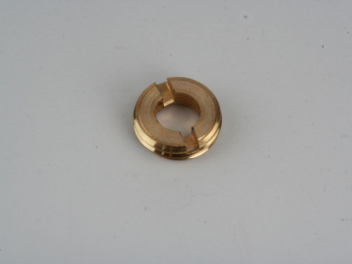 Nut for sealing paint nozzle