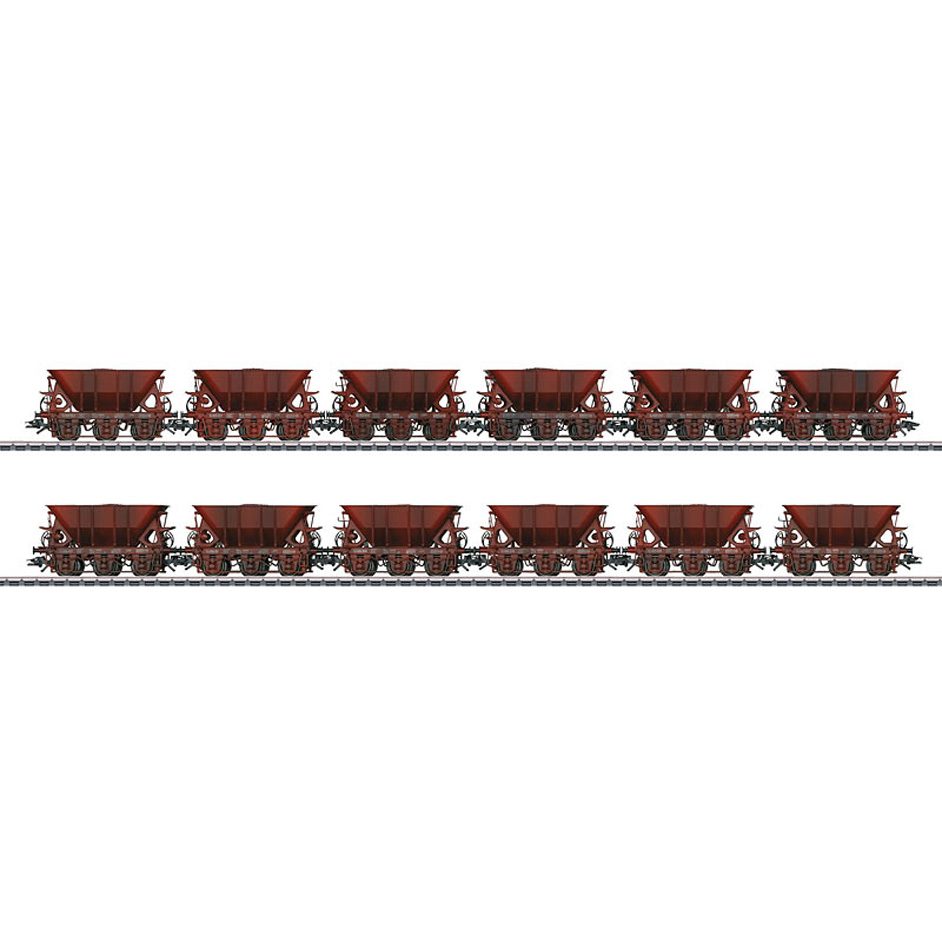 Three stake cars. All CFL Cargo SA wagons with steel plates