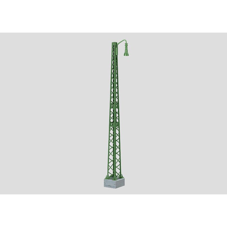 Tower Mast with a Tubular Outrigger Beam for a Hanger Arm