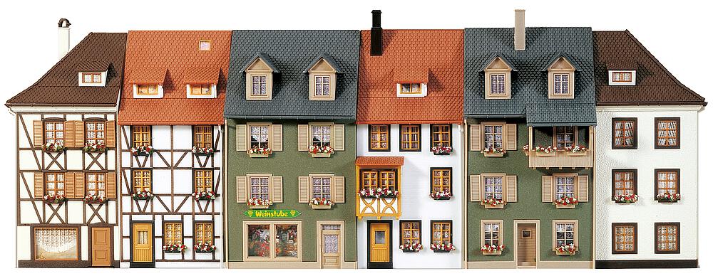 City corner house with tattoo parlour