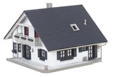 Petrol station with service building