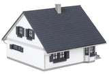 Petrol station with service building