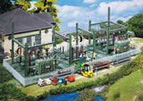Equipment shed, slurry pit