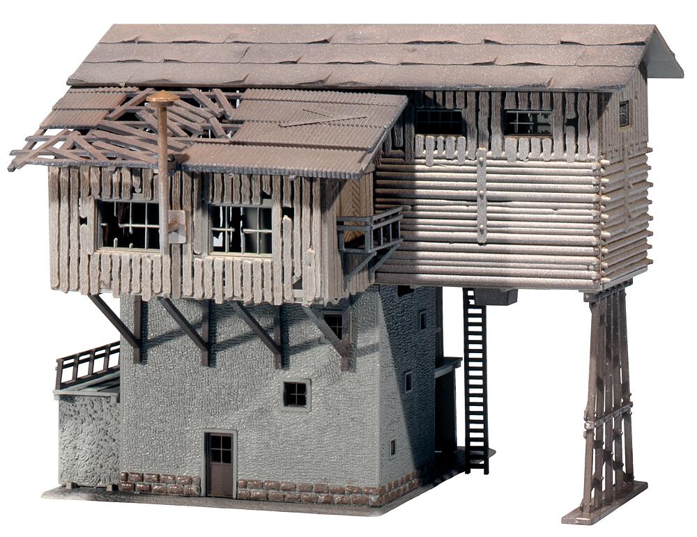 Half-timbered house with well