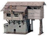 Half-timbered house with well
