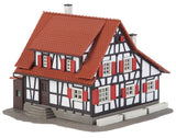 Hunting lodge with raised hide