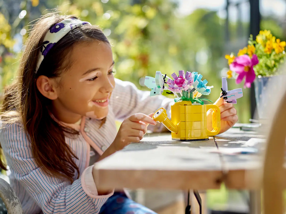 Flowers In Watering Can