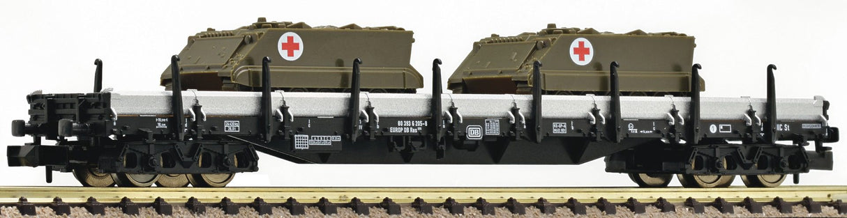 Flat wagon type Res 686 of the DB + 2 M113