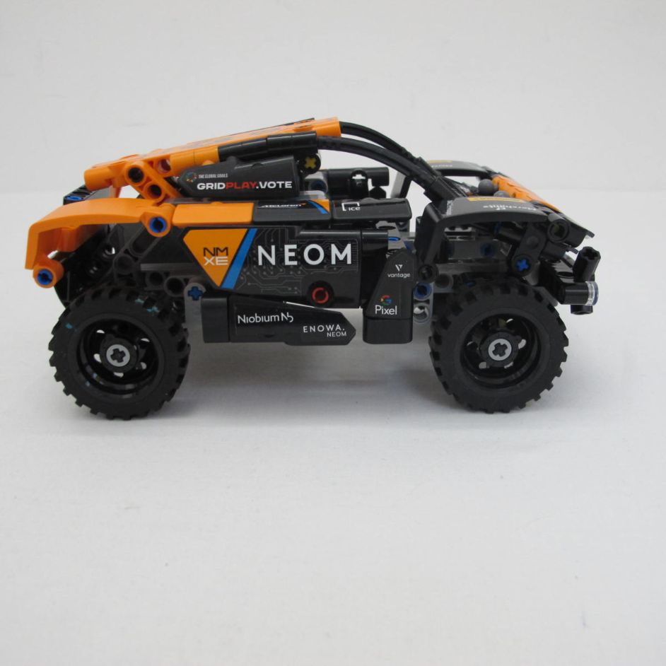 NEOM McLaren Extreme E Team. Complete with instructions and box