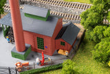 Hunting lodge with raised hide