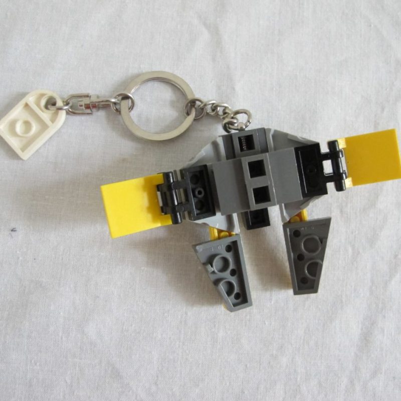 Spaceship keychain in yellow
