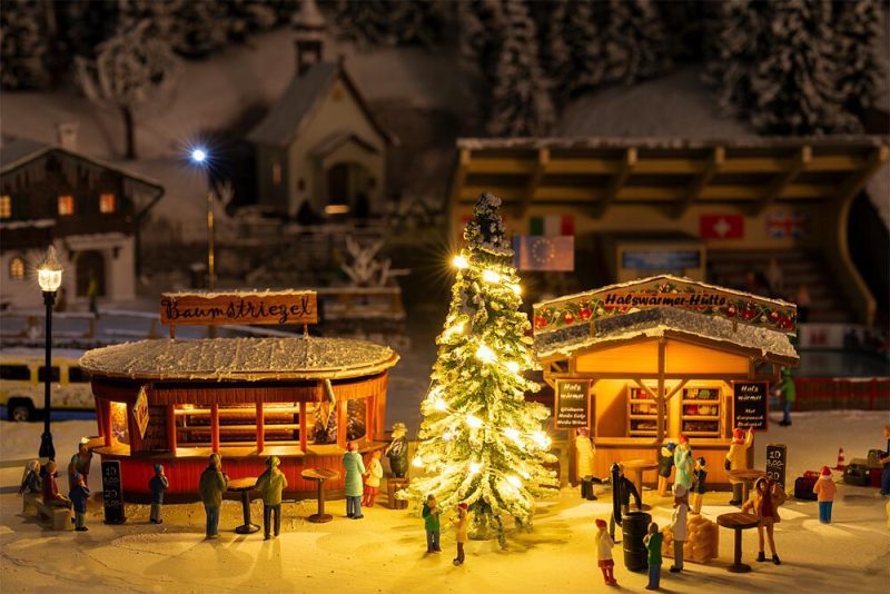 2 Christmas market stalls with moving figures